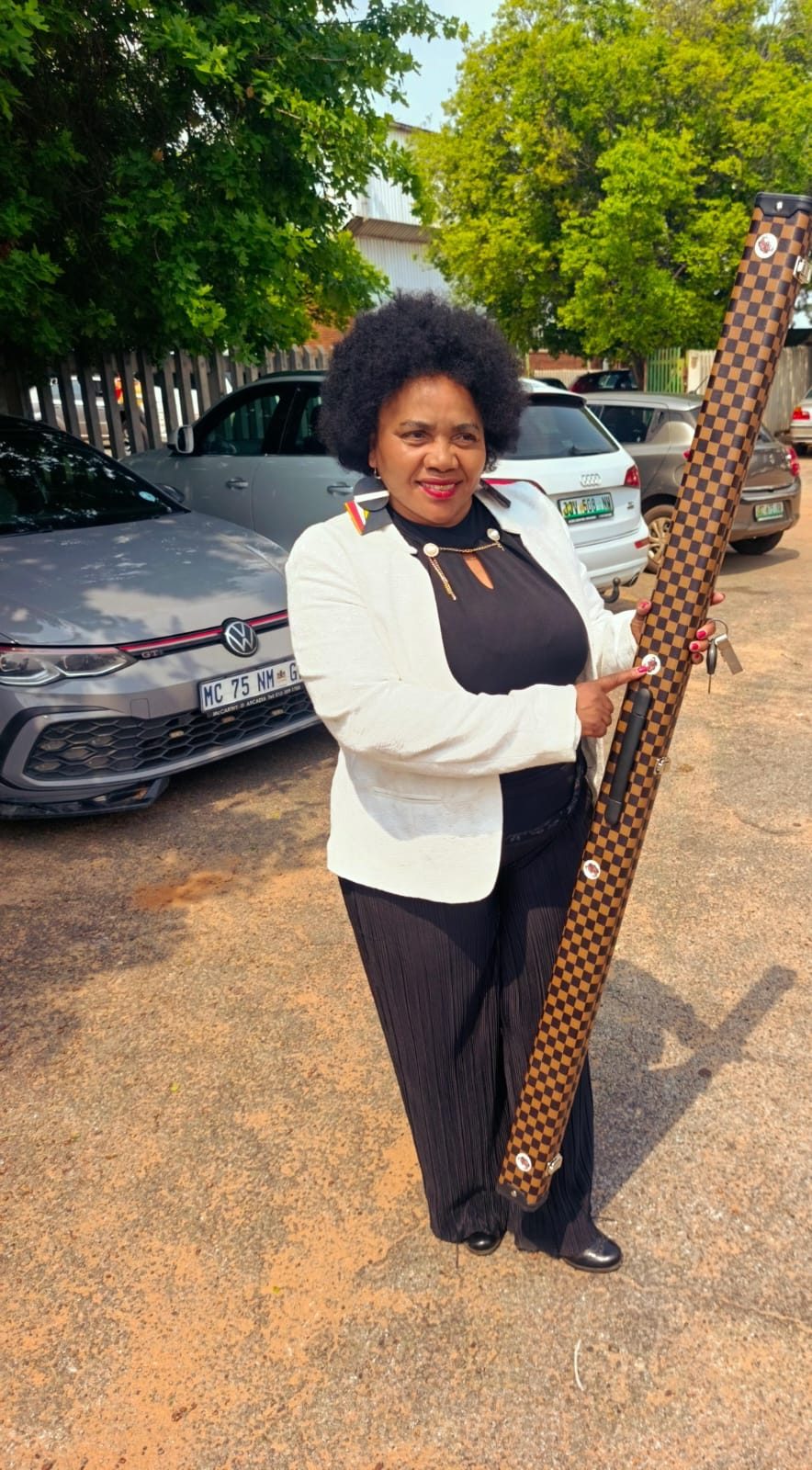 Member with her cue case ready for match day