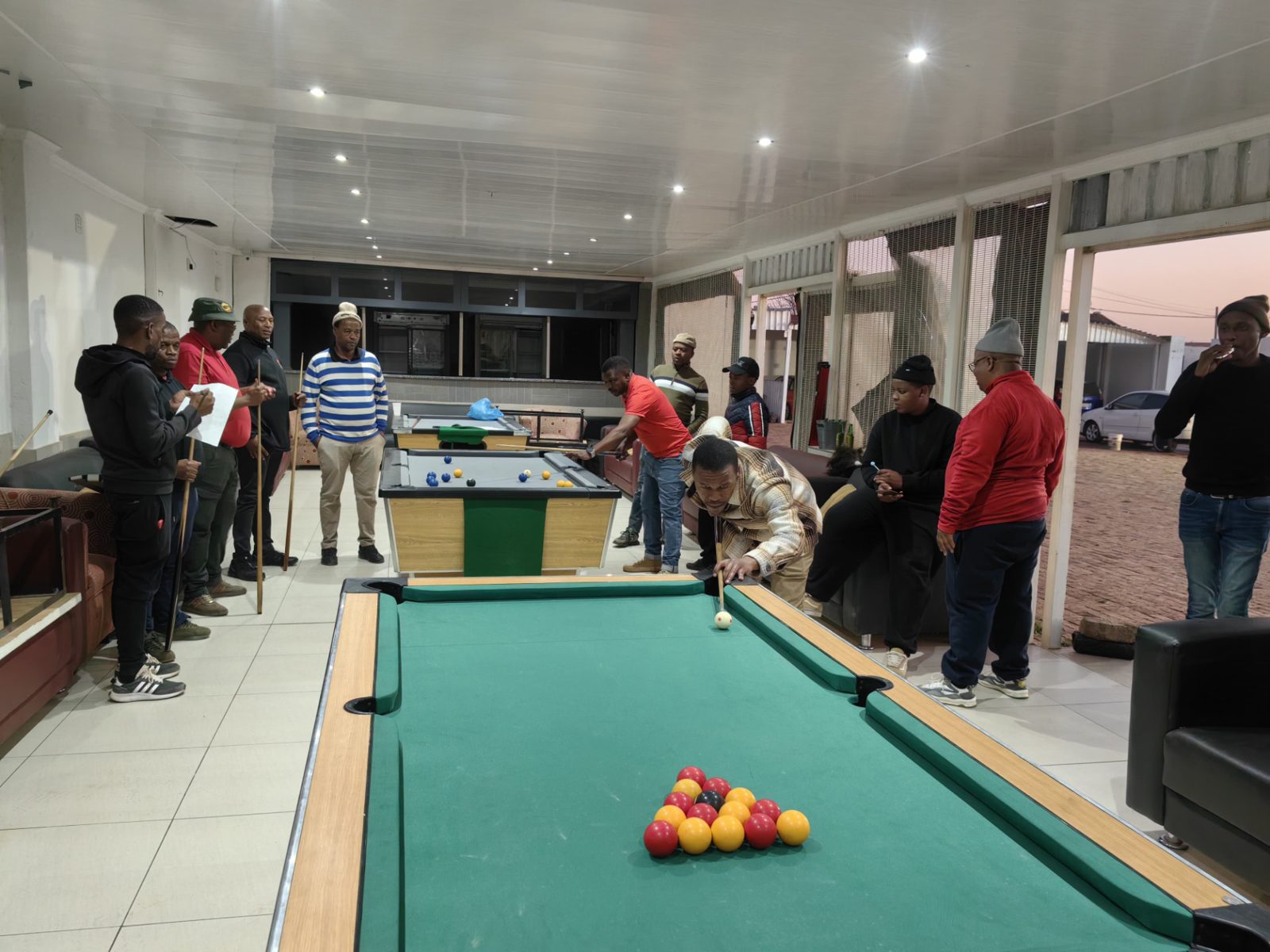 Junior player lining up a shot during coaching
